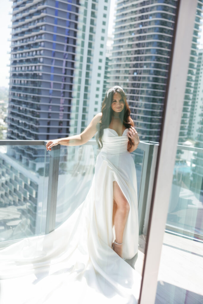 bride on balcony taken by wedding photographer west palm beach