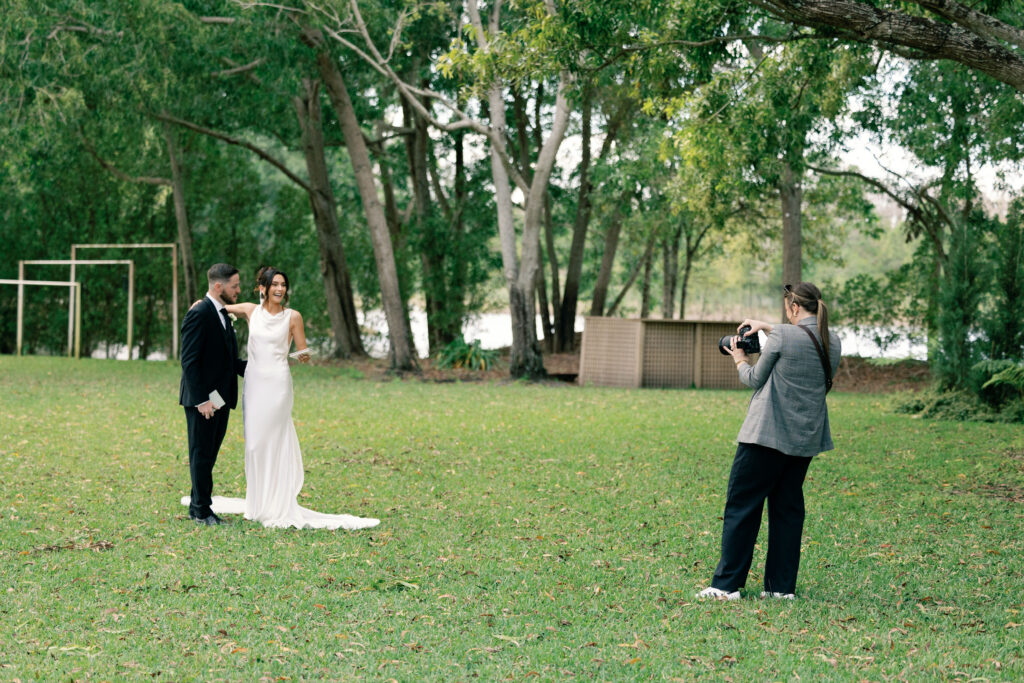 behind the scenes of west palm beach photographer emma miller taking photos of bride and groom