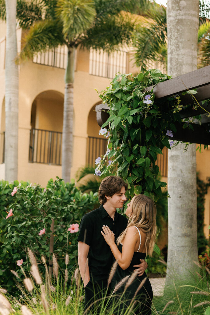 couple looking at each other for Downtown naples florida engagement session