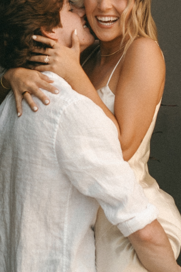 close up of couple kissing at Naples florida downtown engagement photo session