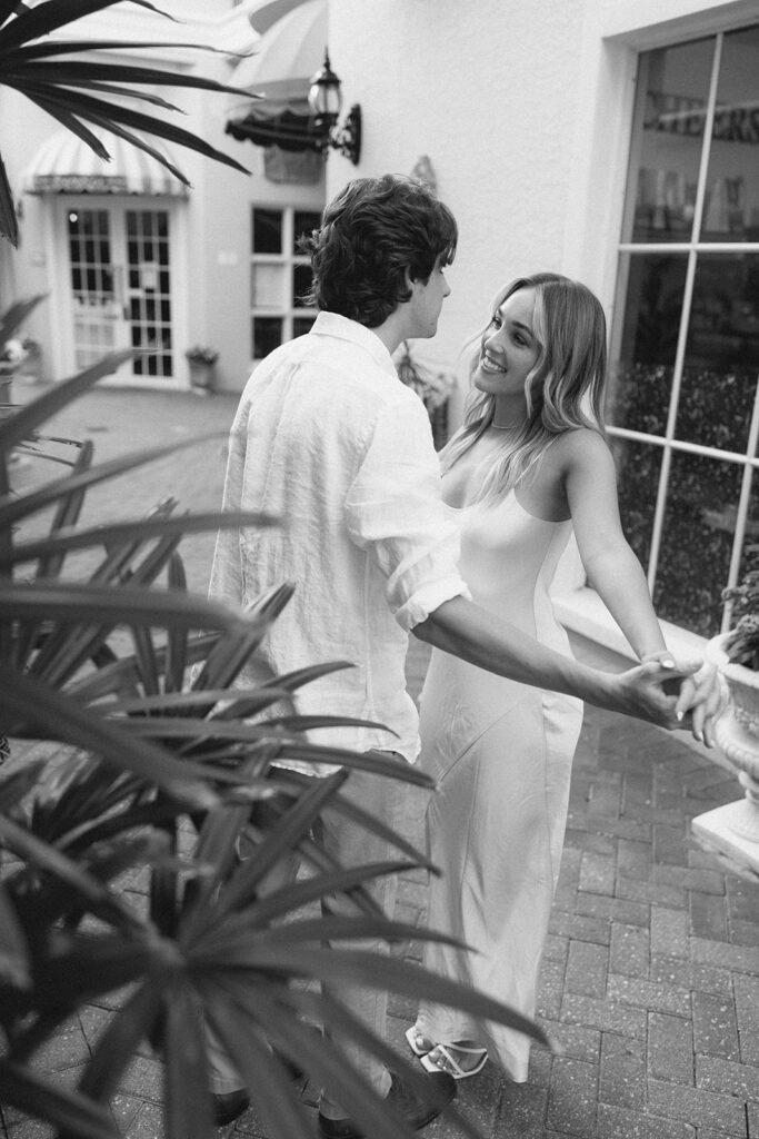 couple in Downtown naples fl for engagement photos