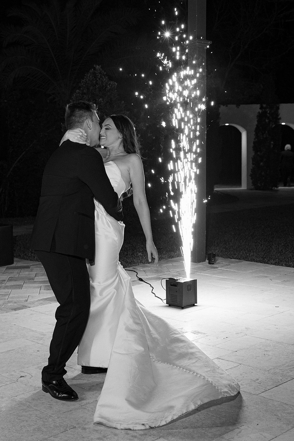 the bride and groom dancing during the wedding reception at la casa toscana