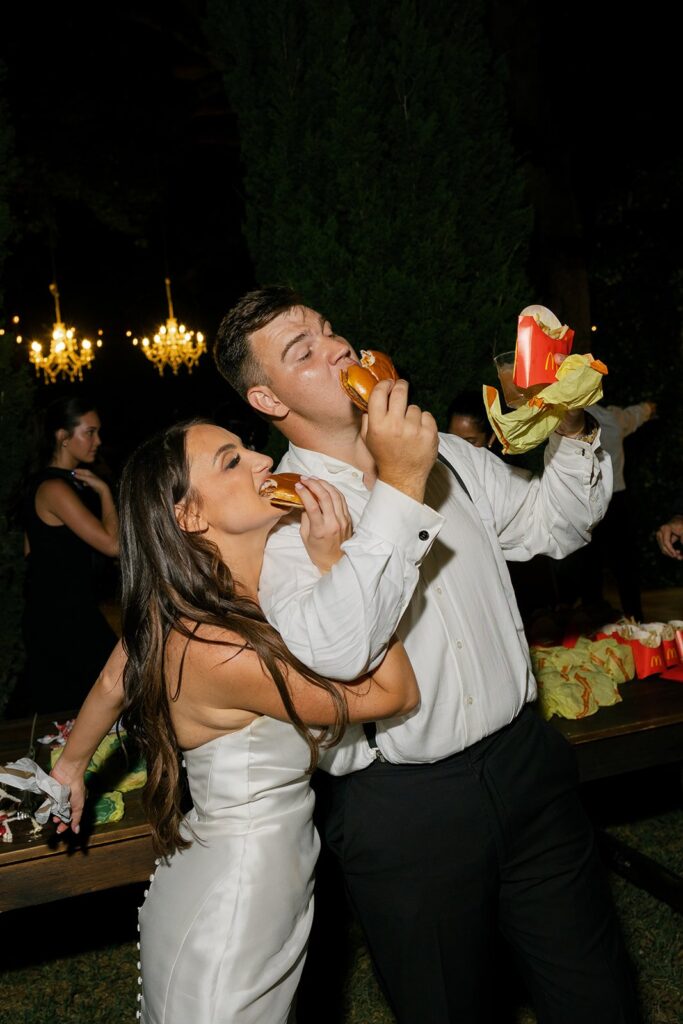 the bride and groom enjoying mcdonalds