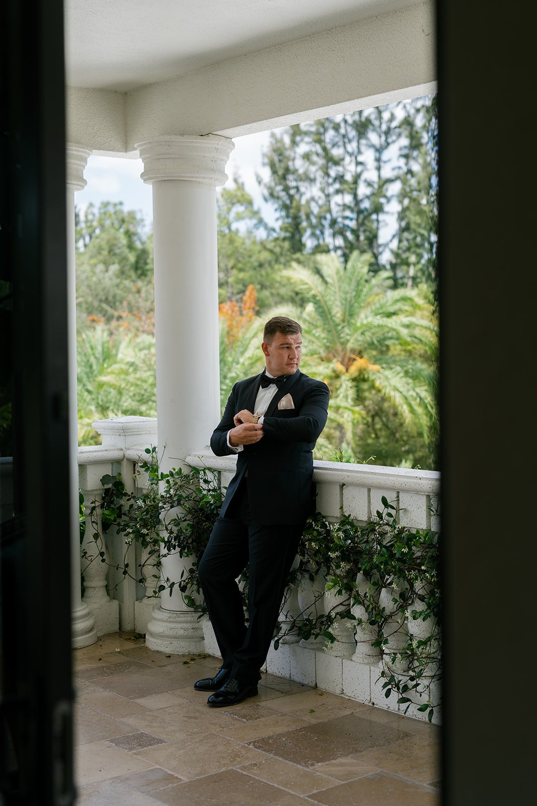the groom getting ready captured by miller photo and film