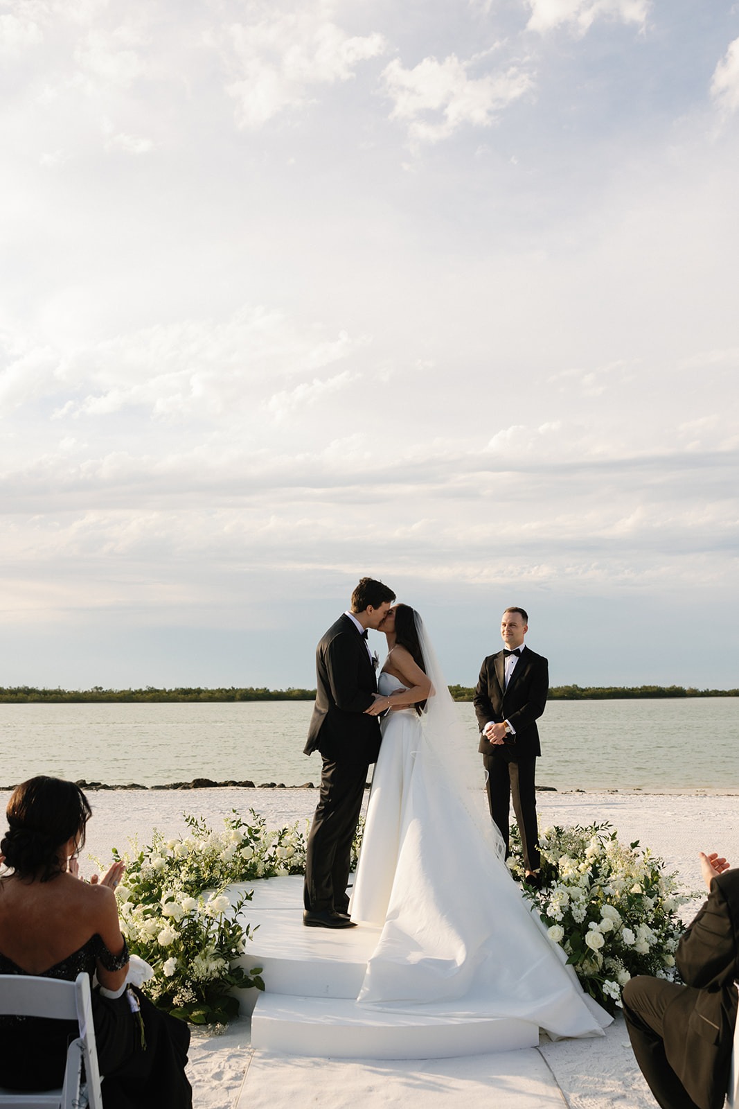 The wedding kiss at the Hideaway beach Club in Naples Florida