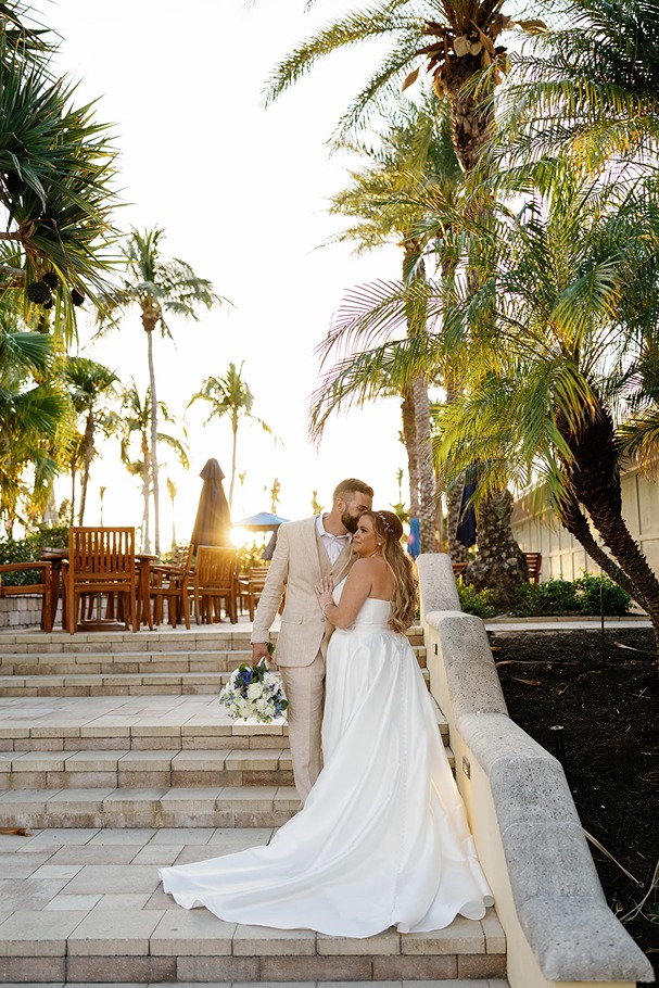The bride and groom at their wedding at Hyatt Coconut Point
