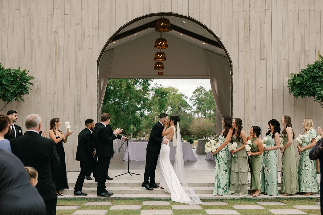 the ceremony captured by a miami wedding photographer at the white trail club