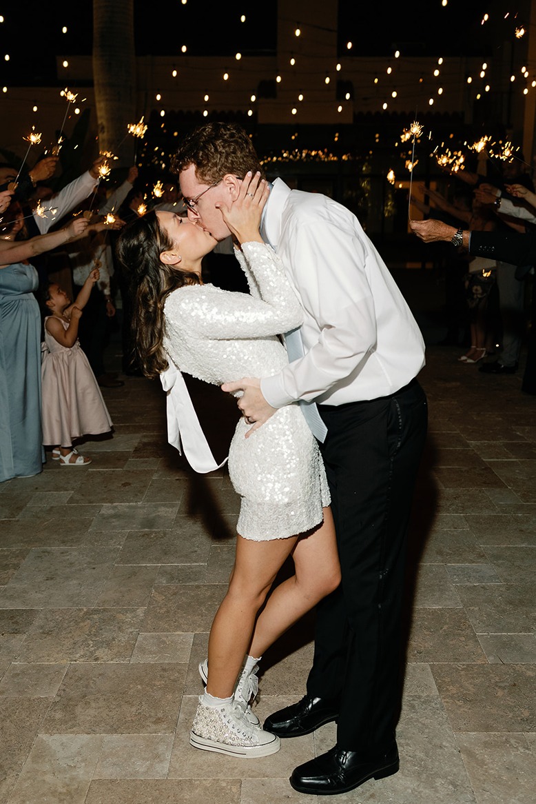 the reception kiss at the white trail club and outdoor wedding venue in south florida