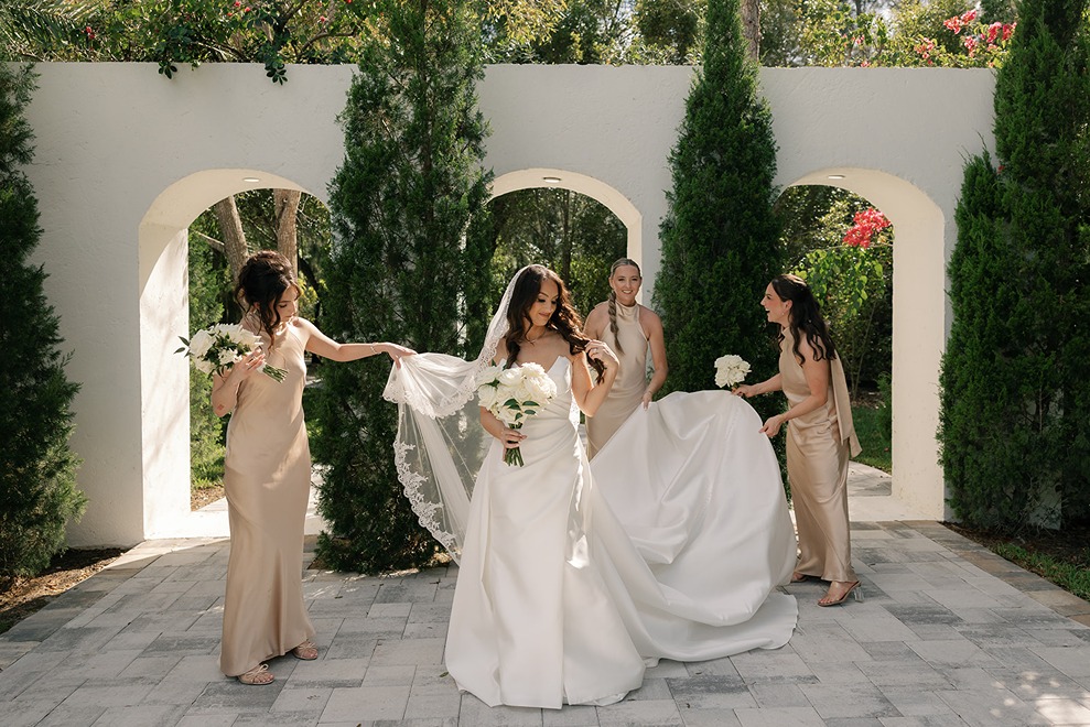 the bride and her bridesmaids at la casa toscana a south florida wedding venue