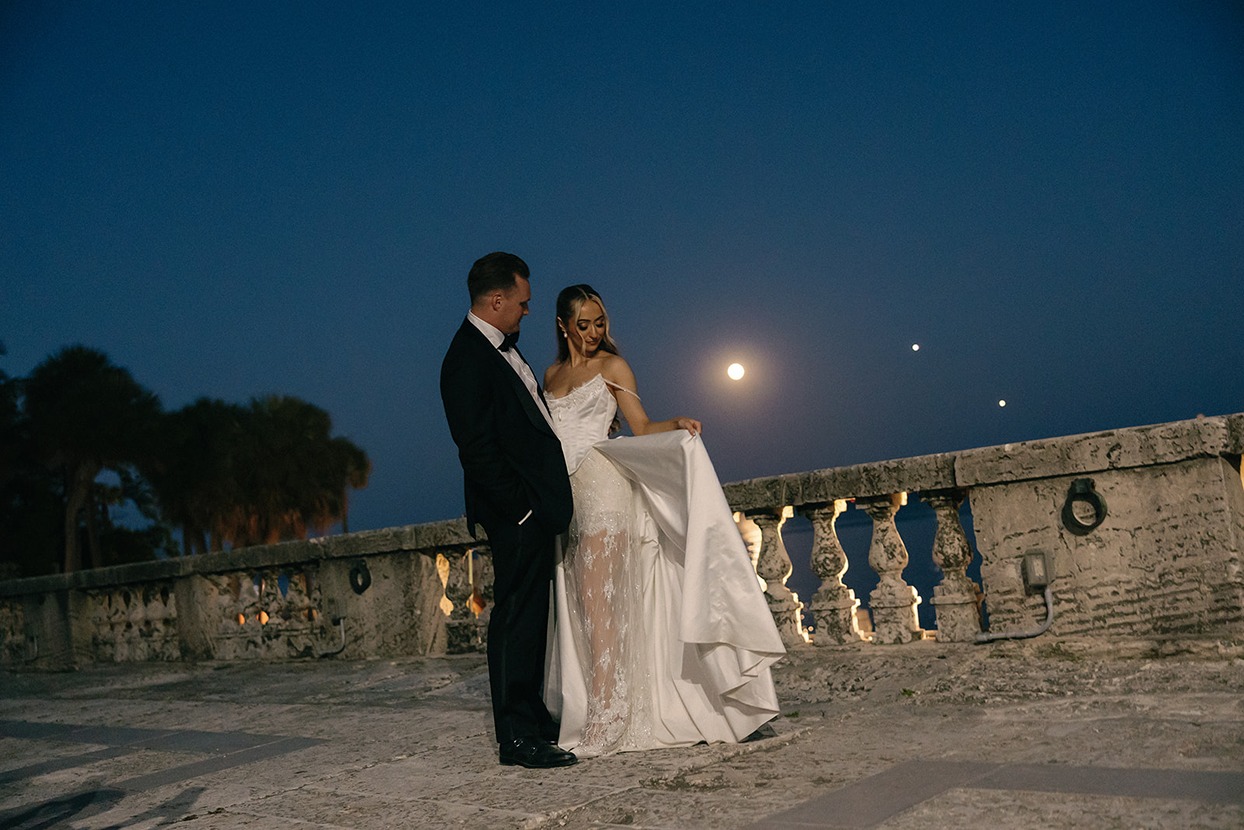 The bride and groom in the moonlight at Vizcaya a wedding venue south florida