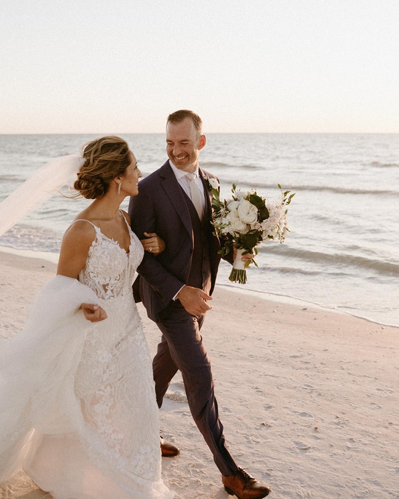 a couple at their south florida beach wedding venues the don cesar