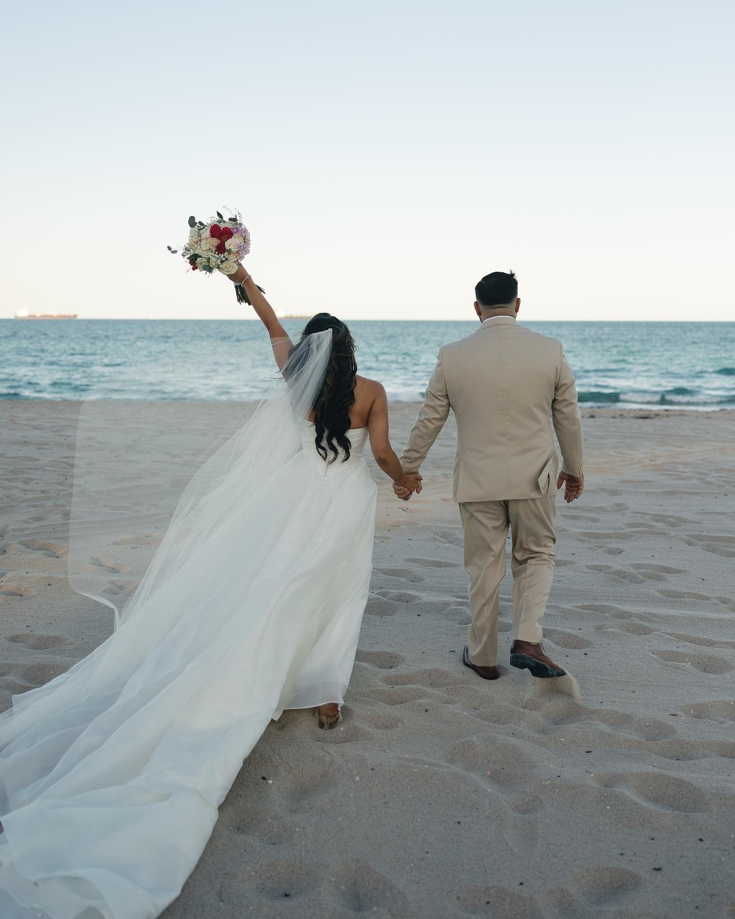 a couple at the marriott harbor one of the beach wedding locations in south florida