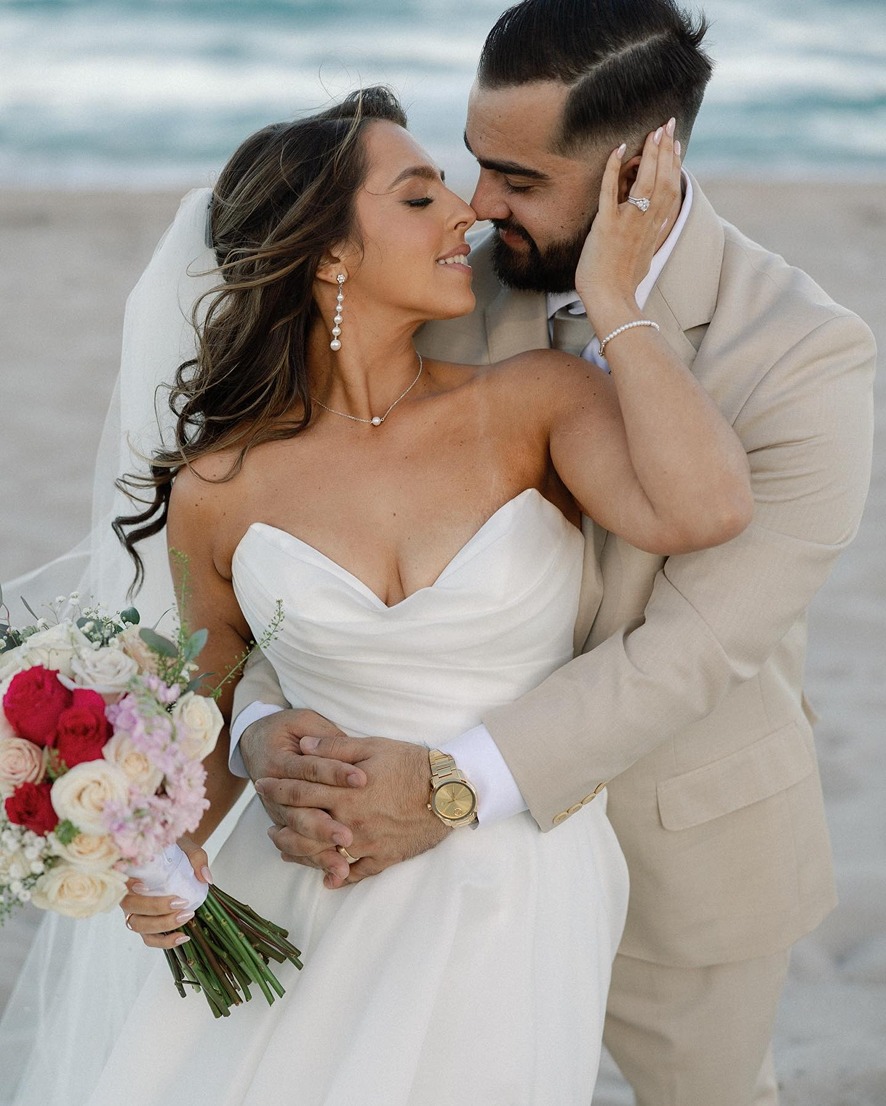 a couple at the marriott harbor one of the beach wedding locations in south florida