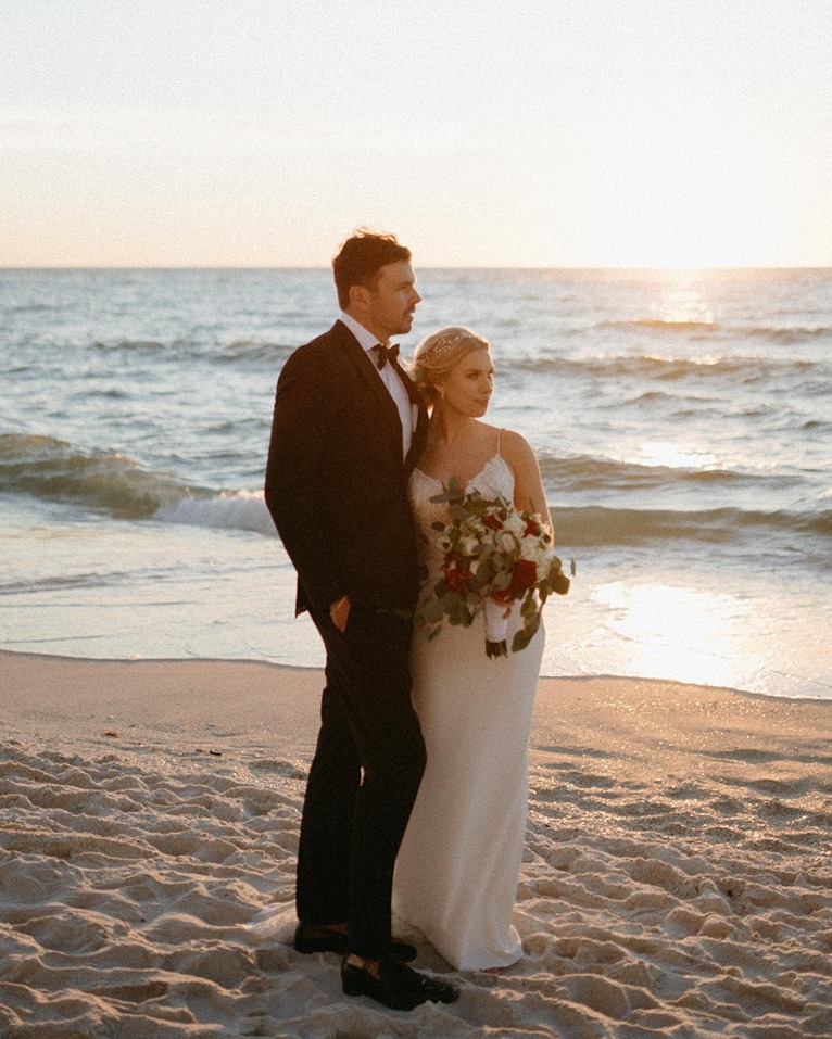 a couple at the la playa beach and golf resort a beach wedding venue in south florida
