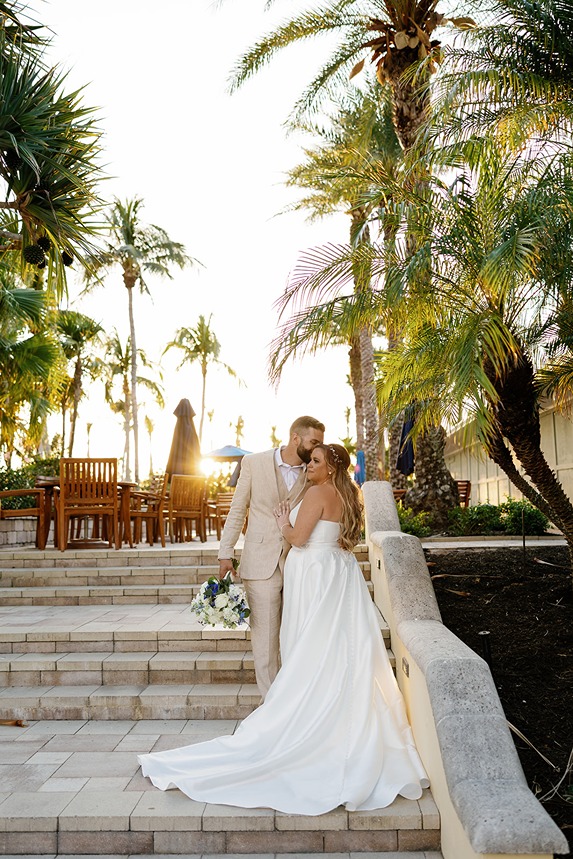 a bride and groom at the south florida weddings near the beach