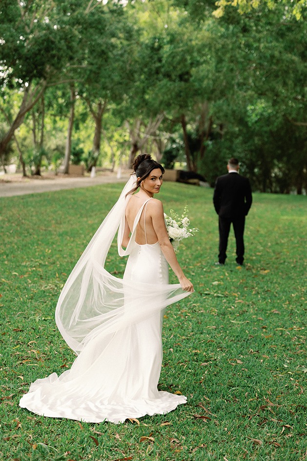 a bride and groom at their ​white trail social and garden club wedding 