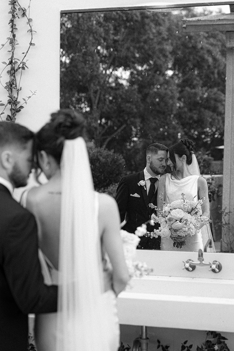 the bride and groom at the ​white trail club wedding venue