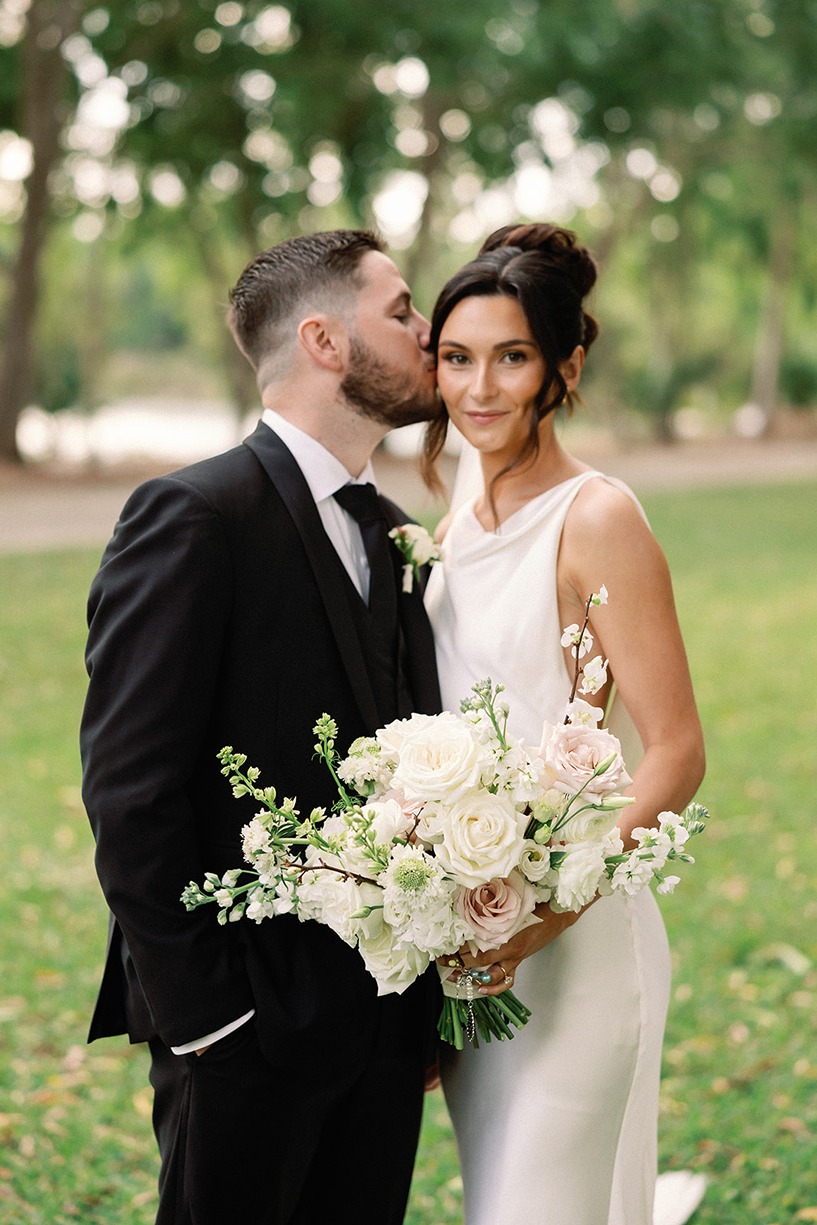 ​white trail club wedding photo of the bride and groom