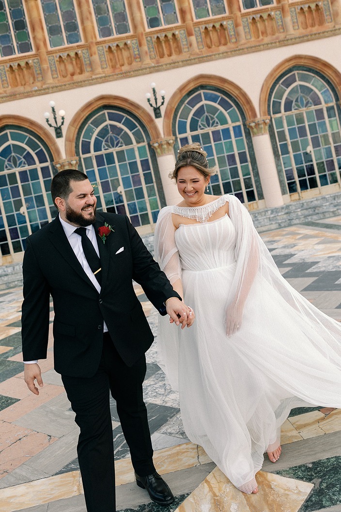 a couple having their wedding at the ringling museum in sarasota fl