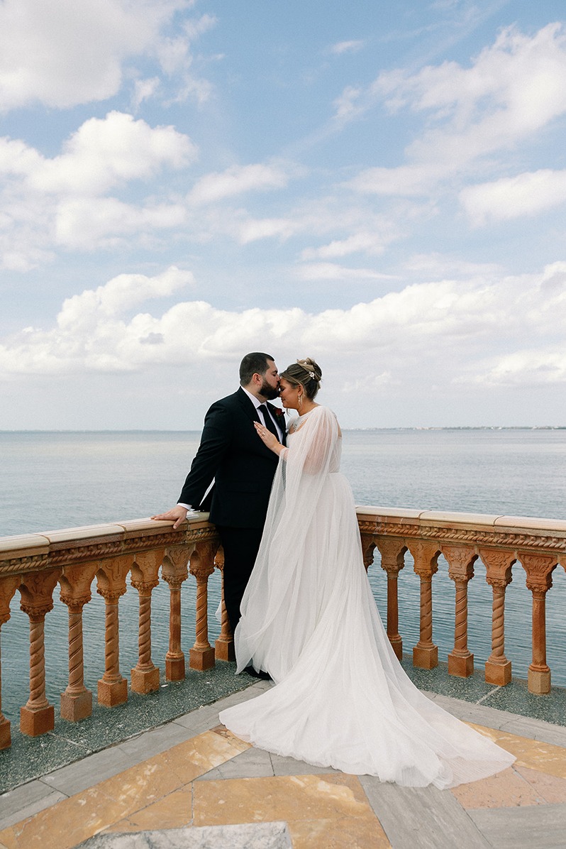 a couple having their wedding at the ringling museum in sarasota fl