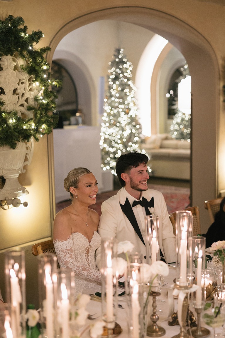 a photo of the bride and groom at their reception taken by an italy destination wedding photographer