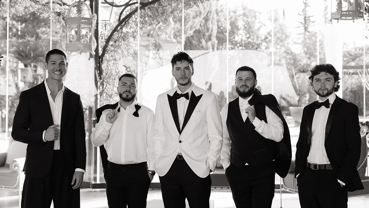 a groom and his groomsmen at one of the best places to get marred in Italy