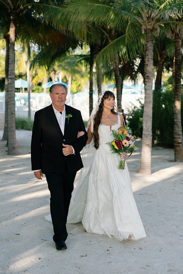 the bride with her father at the isla bella beach resort wedding
