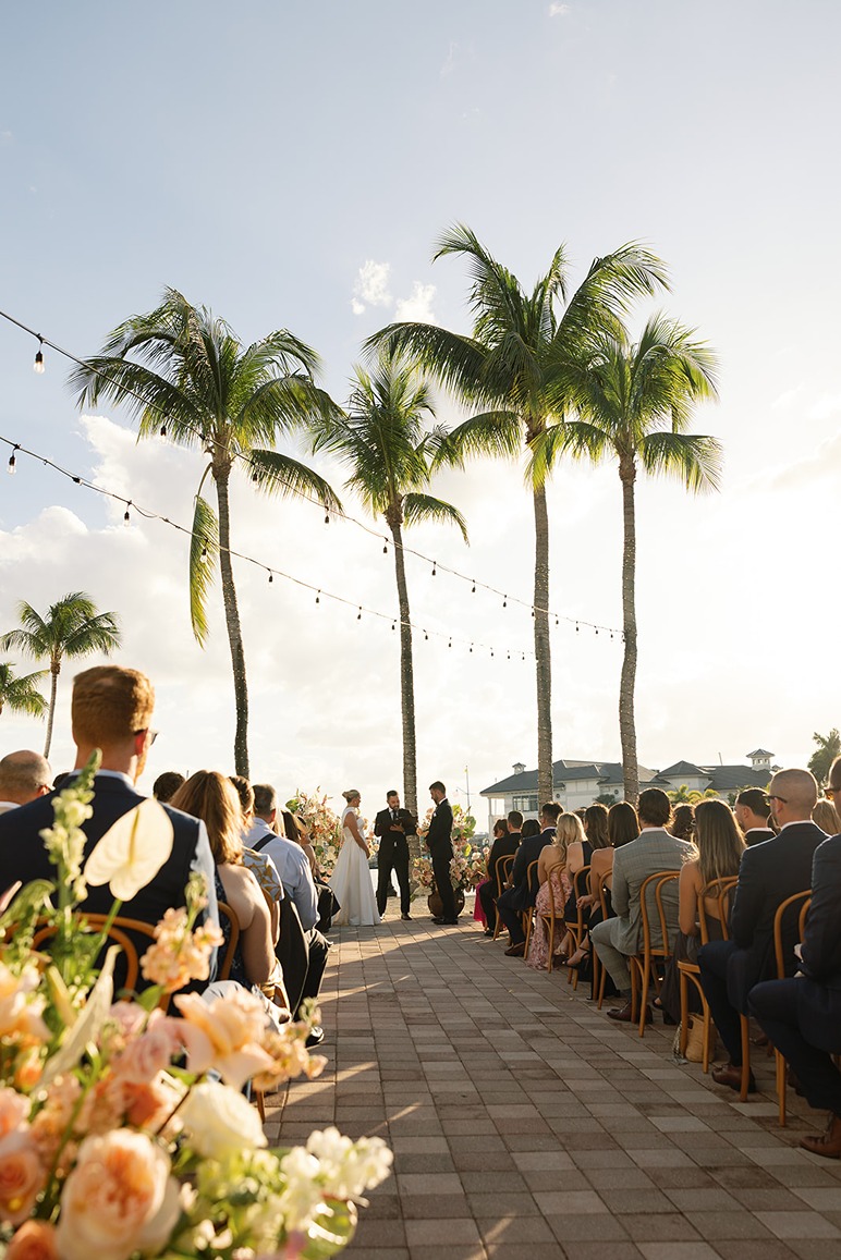 a wedding ceremony at the naples bay resort hotel
