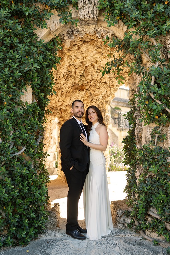 vizcaya museum engagement photos of the guy and girl posing