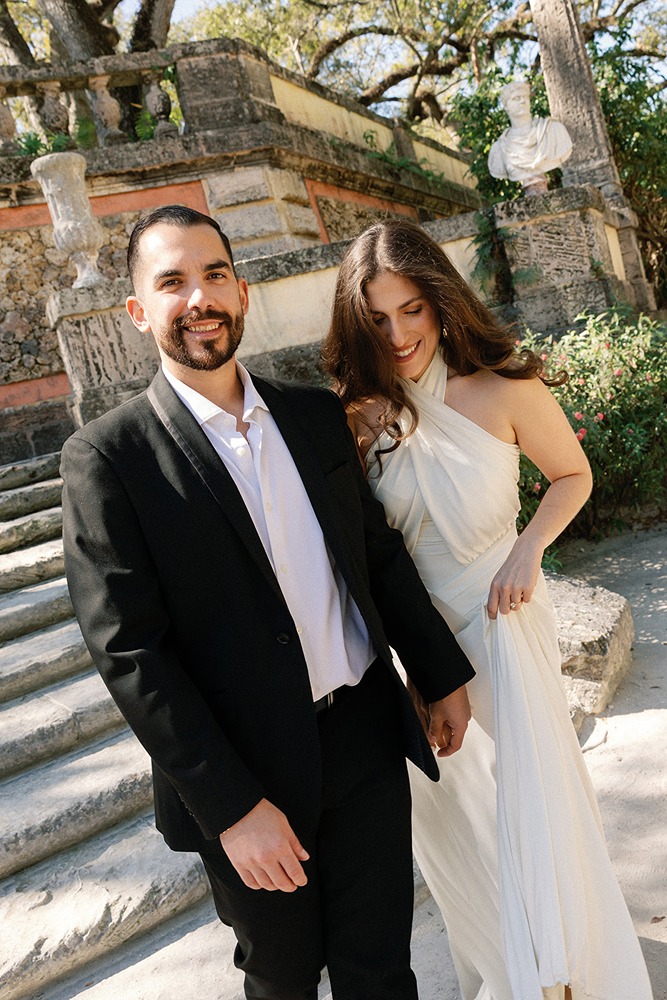 vizcaya museum photos of the couple walking down the stairs