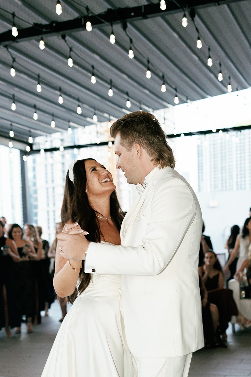 photos of the bride and groom at the penthouse at riverside wharf