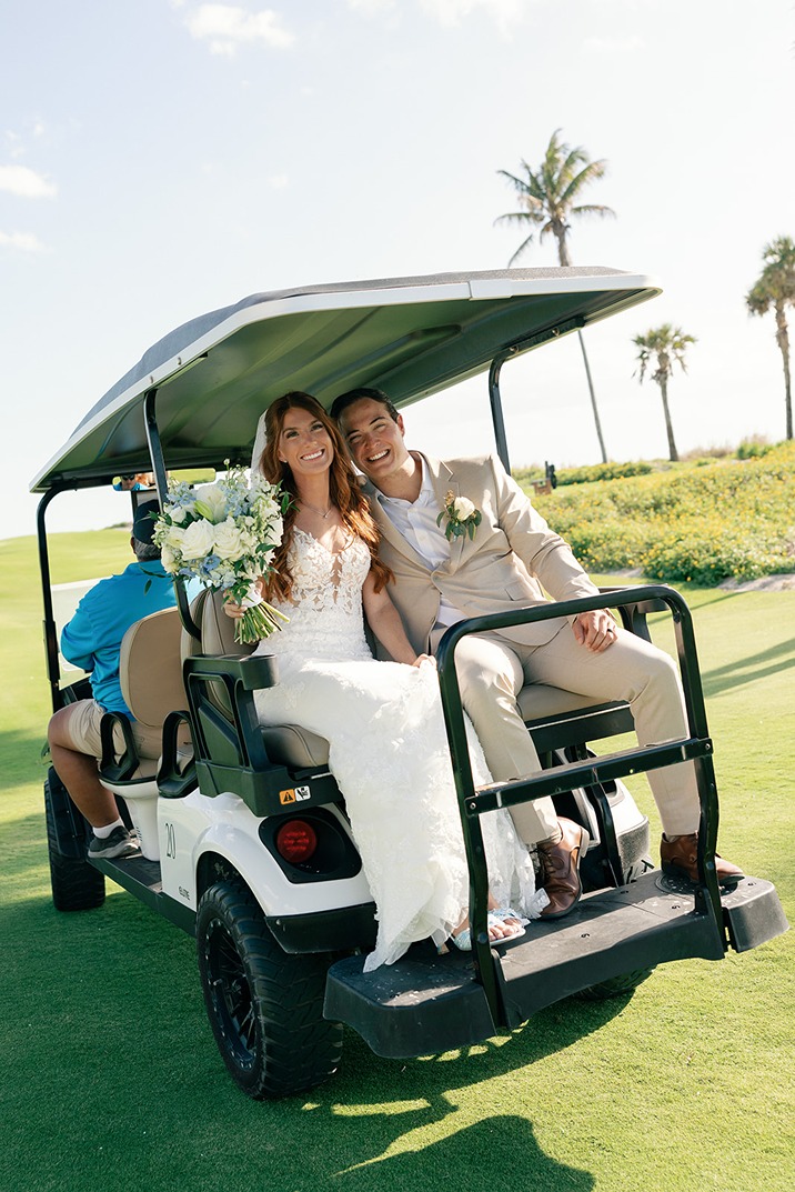 south seas island resort wedding photo of the bride and groom in a golf cart