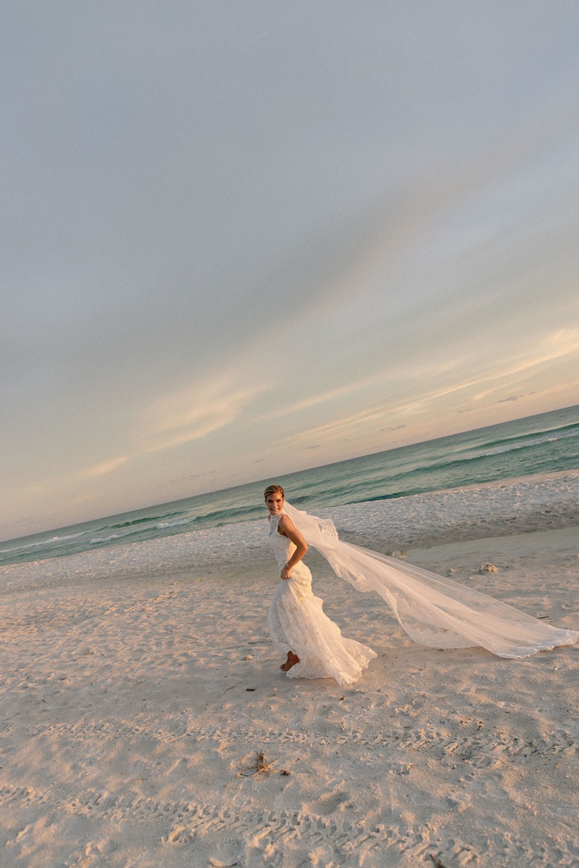 the bride on the beach at her rosemary beach florida wedding