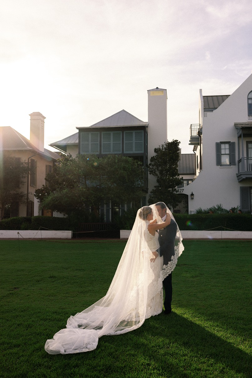 the bride and groom at their rosemary beach florida wedding